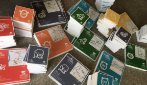 A pile of signs showing various School Loops.