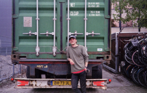 Dan standing in front of truck with bikes